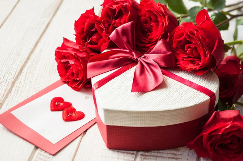 Heart-shaped gift box with flowers, perfect for Valentine's Day gifting.