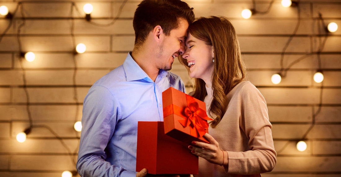 Two couples enjoying a romantic Valentine's Day atmosphere, surrounded by soft lighting and festive decorations, celebrating love and togetherness.