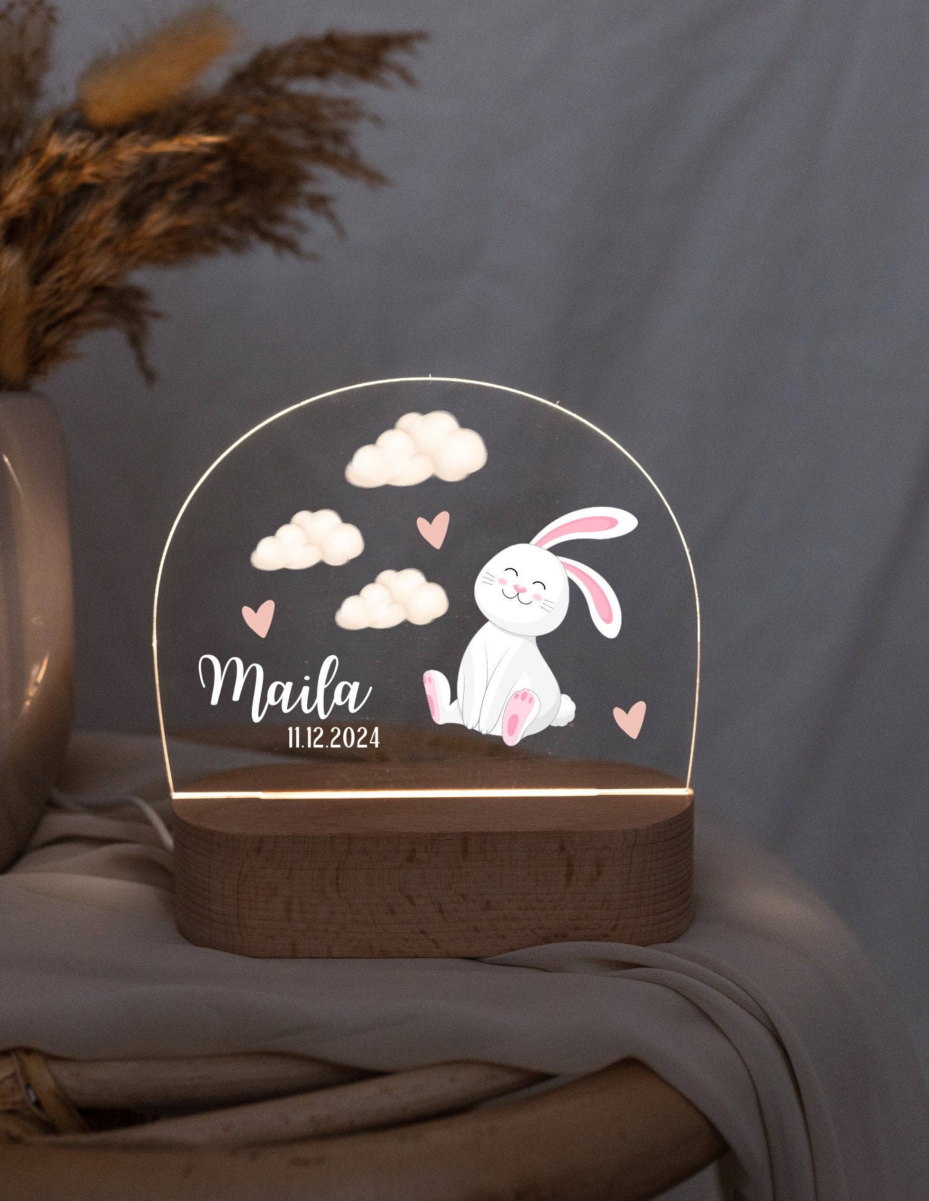 Children's night light featuring a rabbit motif, glowing softly in low light