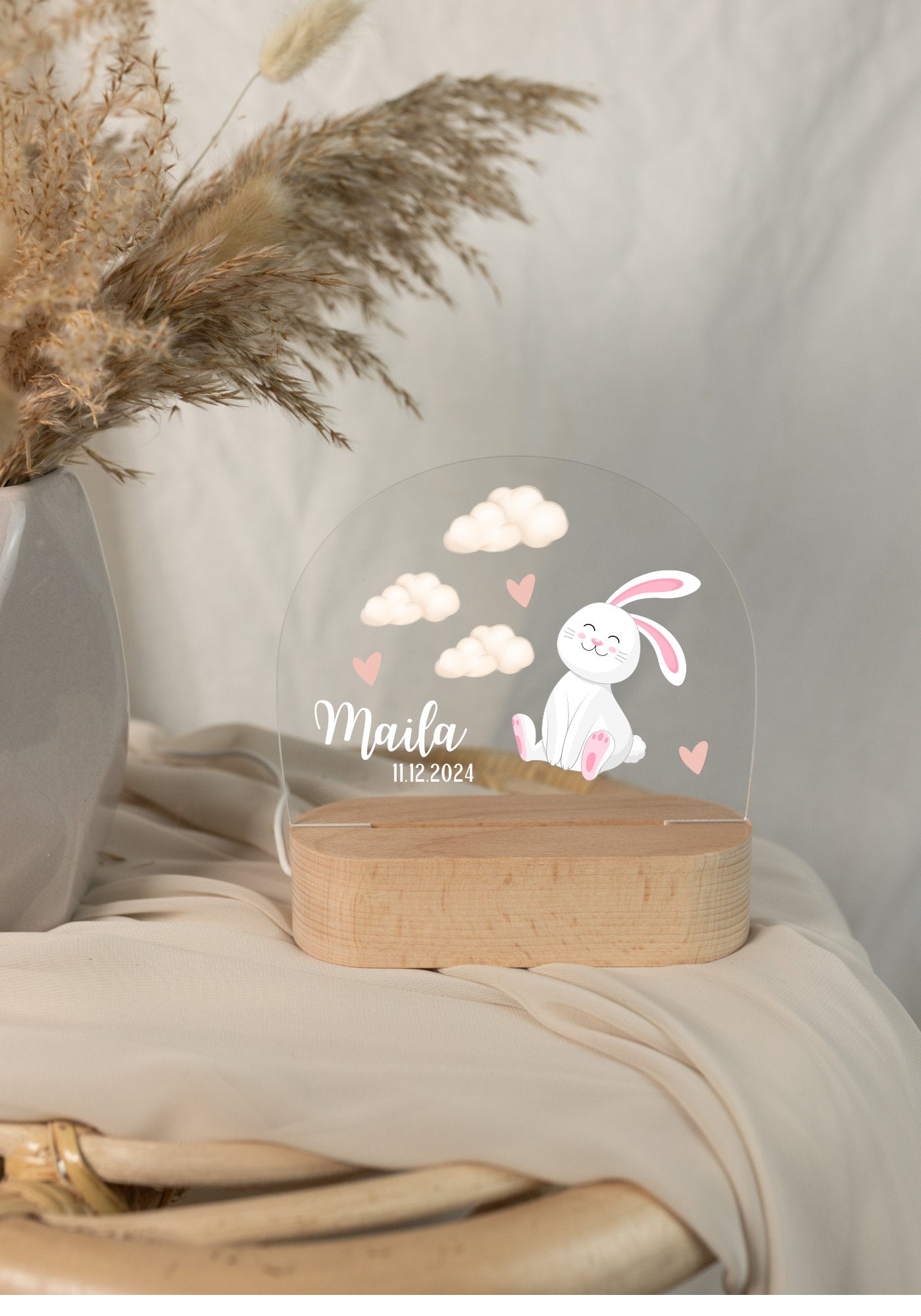 Children's night light with a rabbit motif, displayed in daylight 