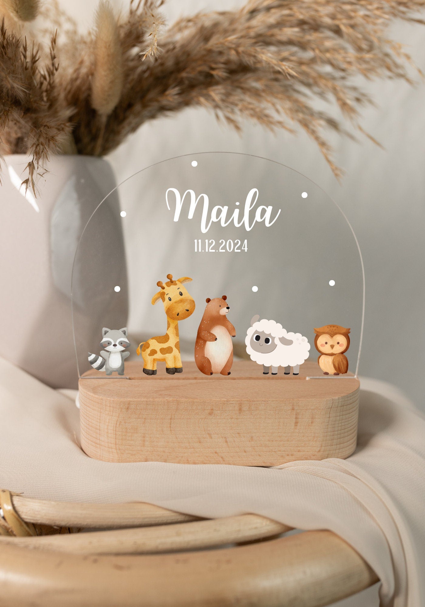 Children's nightlight featuring animal motifs, shown in daylight with a close-up view.
