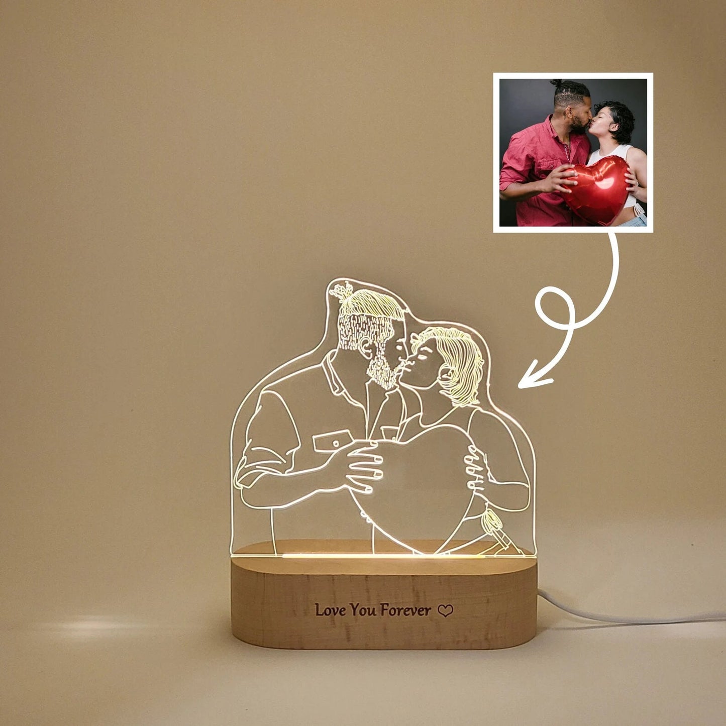 Custom LED photo lamp featuring a couple kissing. The image illustrates how a photo transforms into a lamp, showcasing the engraved design on an acrylic plate.