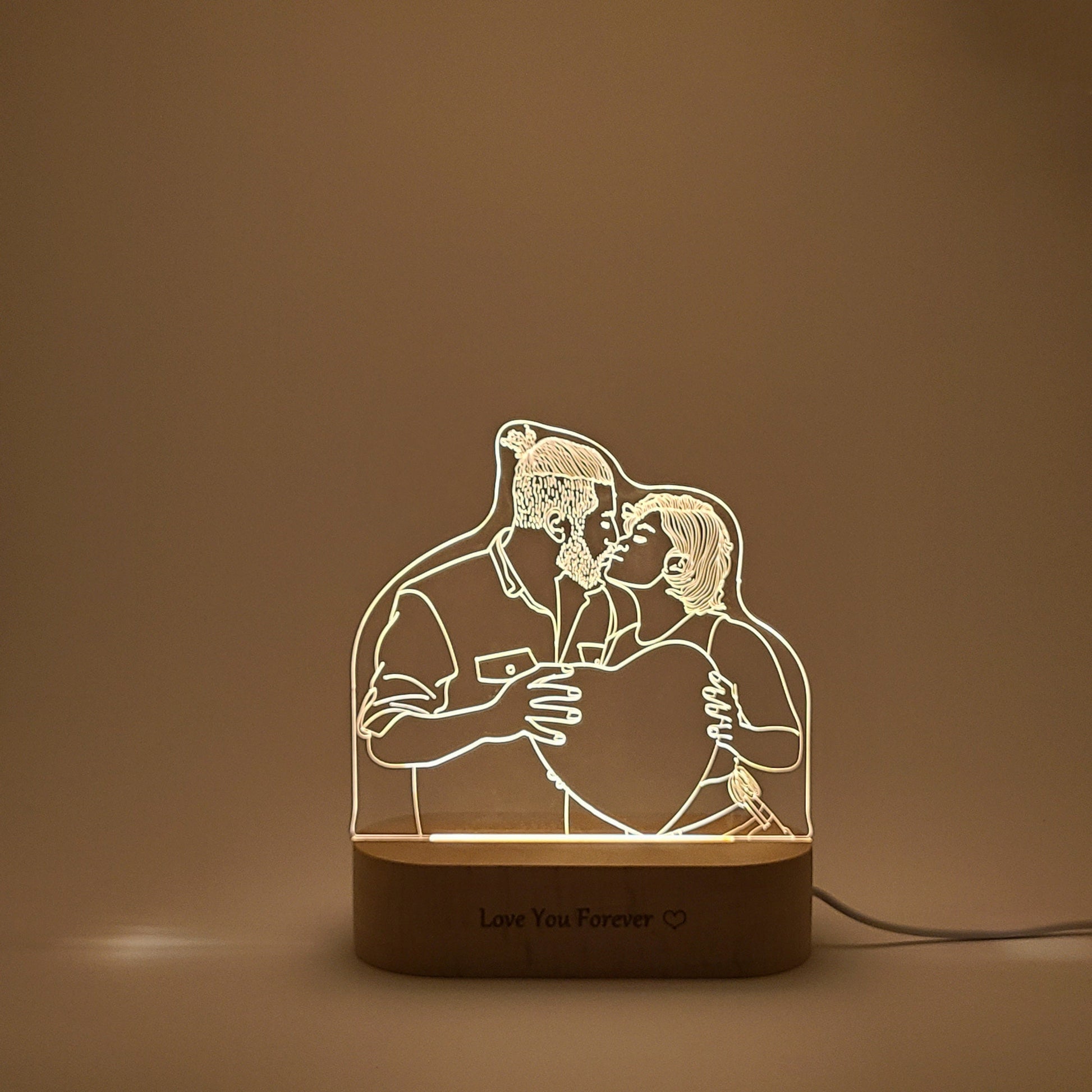 Custom LED photo lamp featuring a couple kissing, displayed in a single and clear position for a focused view.