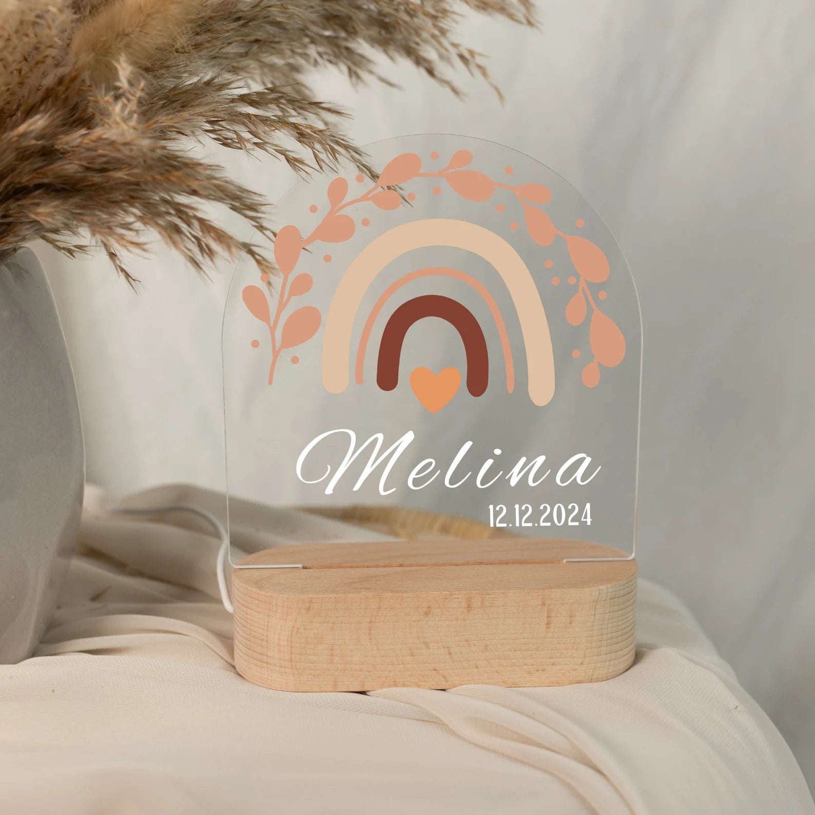 Personalised Rainbow Night Light for Baby,  displayed in daylight with close-up view.