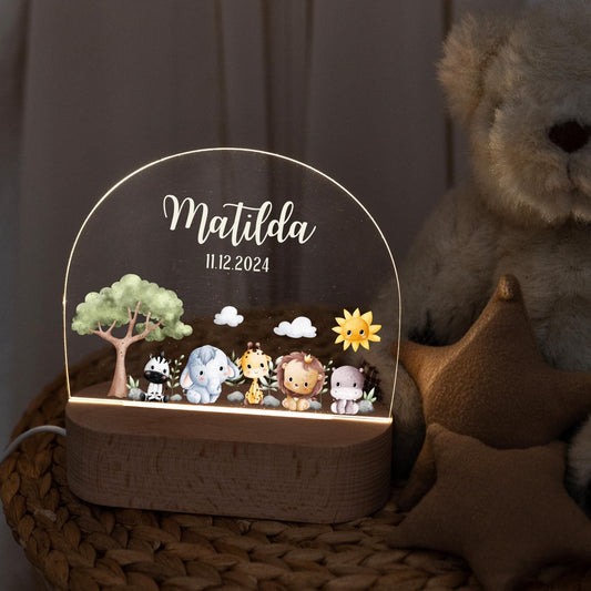 Personalised children's lamp with animal motif for the children's room, taken in dark light