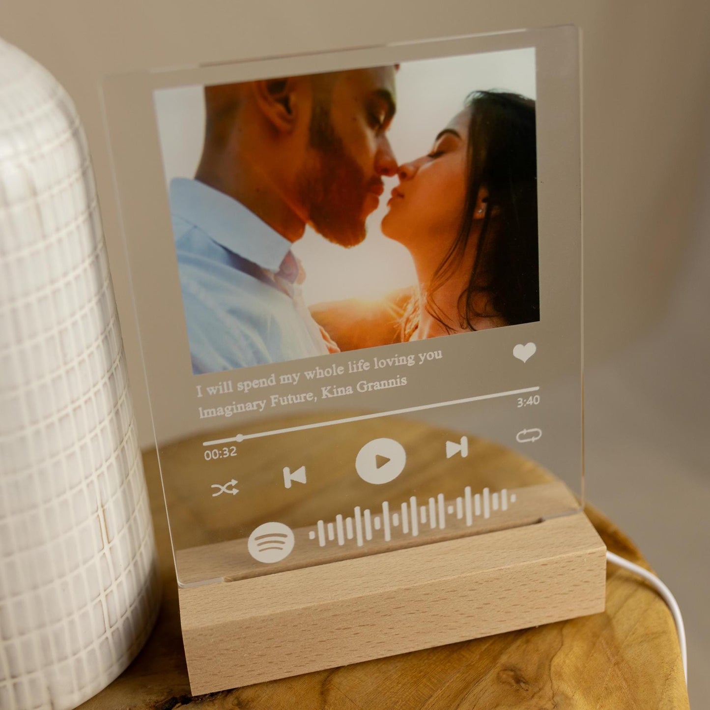 Personalised music photo lamp of a couple in love in daylight, close-up shot