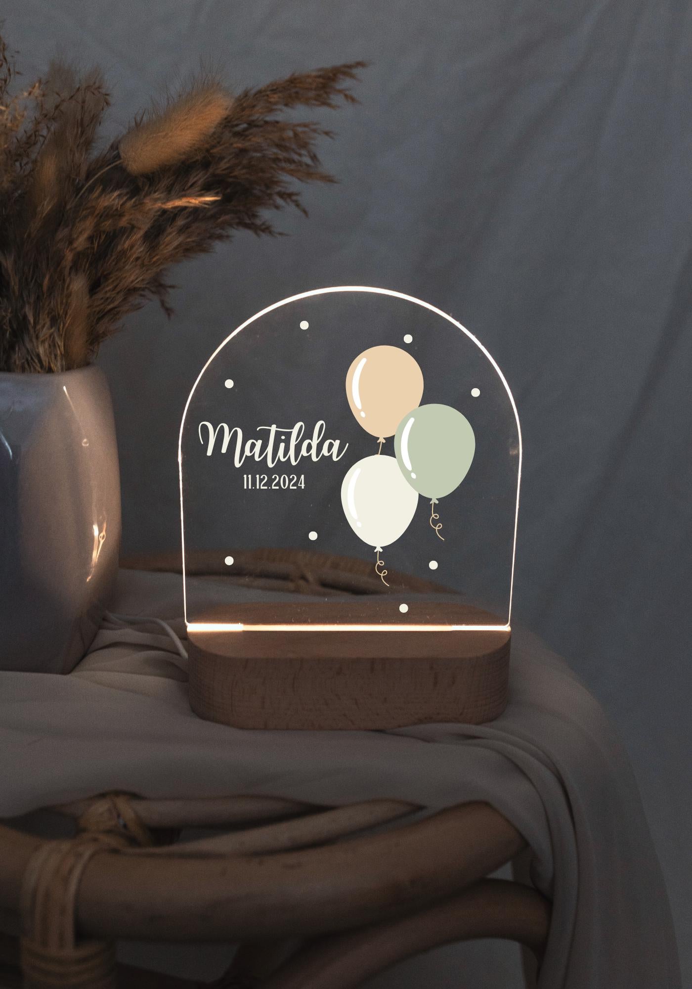 Personalized balloon night light, displayed in low light